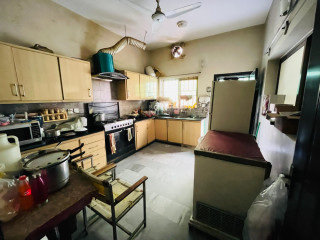 Luxurious 1 Kanal Double-Story House for Sale in DHA Garden Villas Prime Location with Spacious Parking & Elegant Design